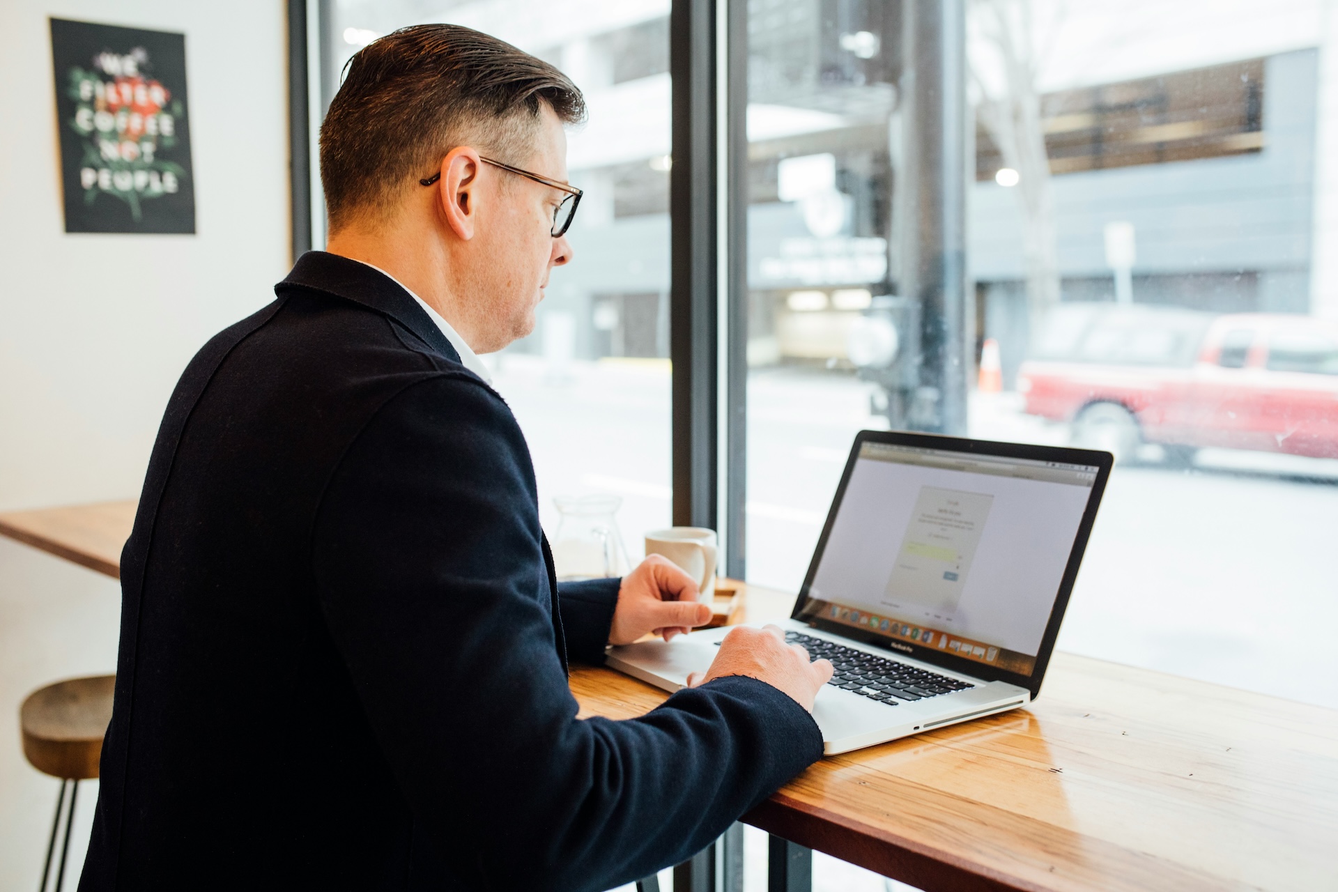 Job seeker improving CV and LinkedIn profile to enhance professional visibility