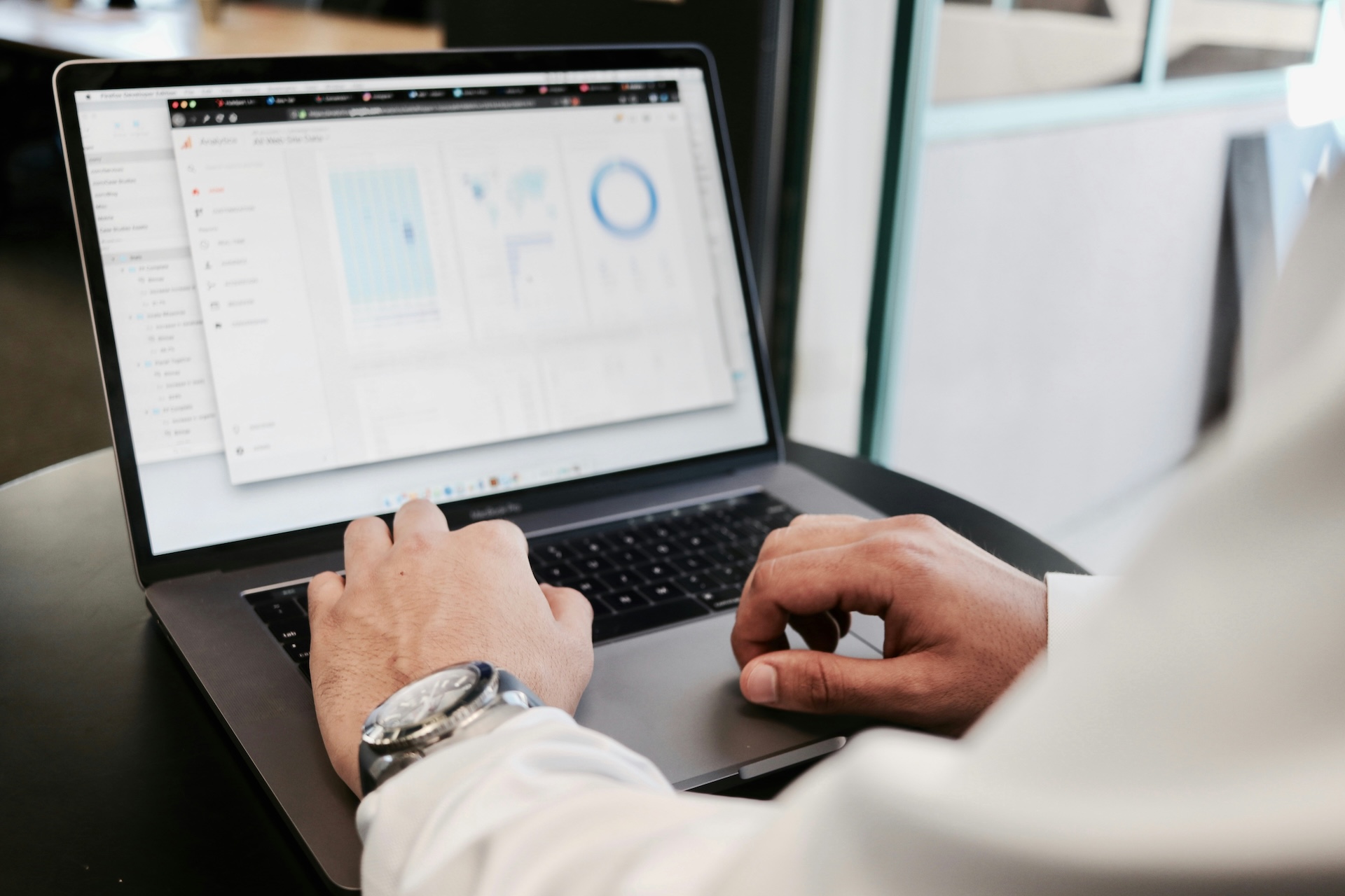 HR professional analysing UK employment trends and workforce data charts